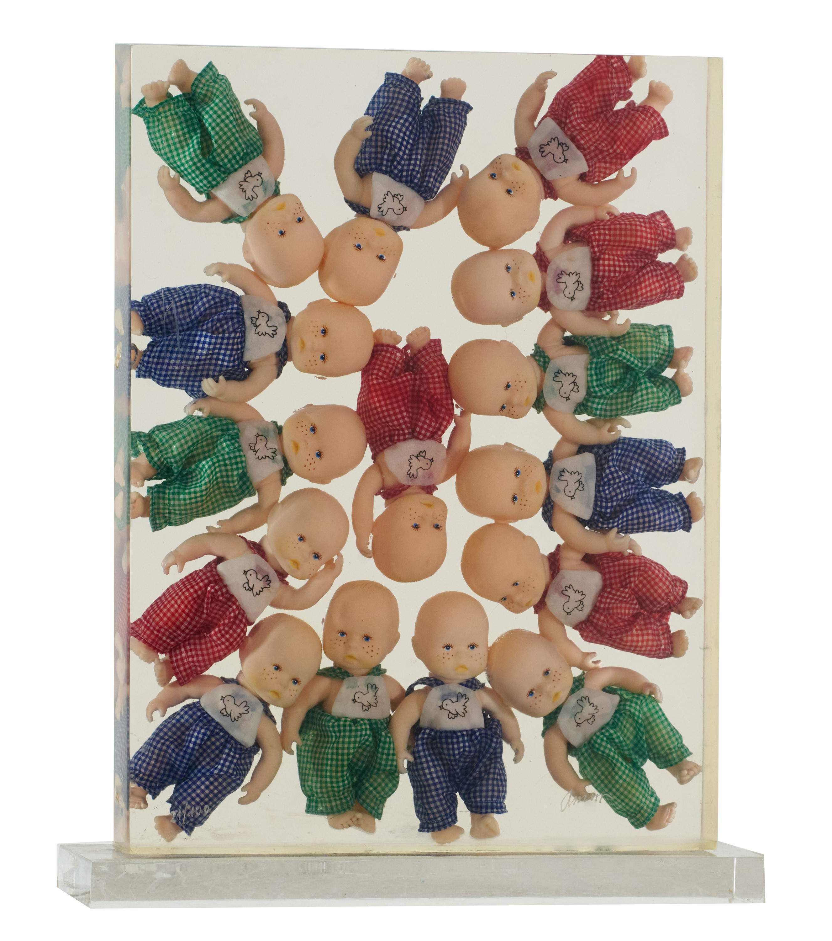 Arman - Bambole. Inclusione in resina, 2001